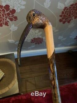 An Ian Taylor Curlew topped walking cane, length 125cm
