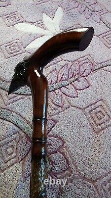 Anes and walking sticks. Wod walking cane raven. Walking stick raven. Cane Carved