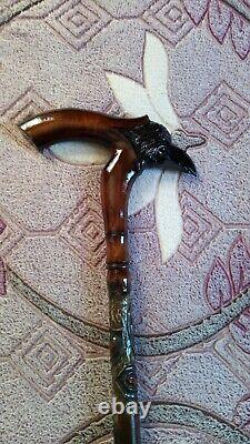 Anes and walking sticks. Wod walking cane raven. Walking stick raven. Cane Carved