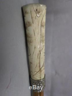 Antique Asian carved cane with silver collar, signed bamboo shaft