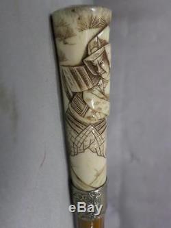 Antique Asian carved cane with silver collar, signed bamboo shaft