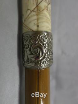 Antique Asian carved cane with silver collar, signed bamboo shaft