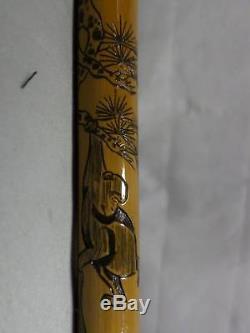 Antique Asian carved cane with silver collar, signed bamboo shaft