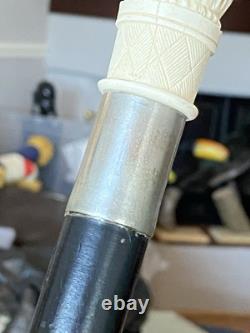Antique Black Laquered Walking Stick With Carved Wooden Floral Motif Handle