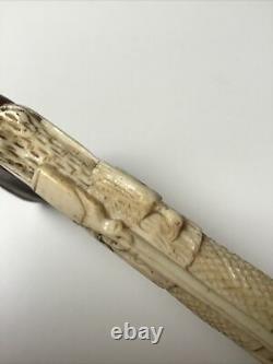 Antique Carved Shooting Scene Walking Cane