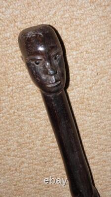 Antique Ebony African Tribal Walking Stick Hand-Carved African Man Glass Eyes