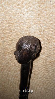 Antique Ebony African Tribal Walking Stick Hand-Carved African Man Glass Eyes