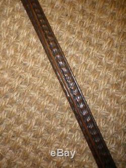 Antique Hand Carved Textural Walking Stick With An Inlay Pattern