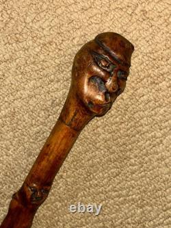 Antique Rustic Walking Stick / Cane Hand-Carved Grotesque Head & Faces Shaft