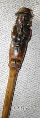 Antique Rustic Walking Stick Cane Hand-Carved Man Musician With Instrument Oboe