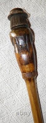 Antique Rustic Walking Stick Cane Hand-Carved Man Musician With Instrument Oboe