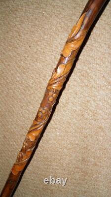 Antique Rustic Walking Stick Hand-Carved Leaves & Berries & Bird Talon Handle