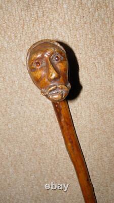 Antique Rustic Walking Stick Hand-Carved Man Head Top Glass Eyes