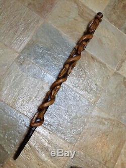 Antique Vintage Hand Carved Tribal Cane Walking Stick Multiple Faces & Snake