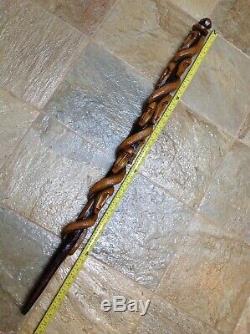 Antique Vintage Hand Carved Tribal Cane Walking Stick Multiple Faces & Snake