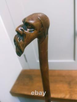 Antique carved unique character head figural walking stick 31 81cm c1900