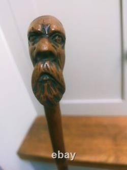 Antique carved unique character head figural walking stick 31 81cm c1900