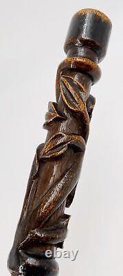 Antique folk art carved walking stick with snakes lizard dated 1911 cane