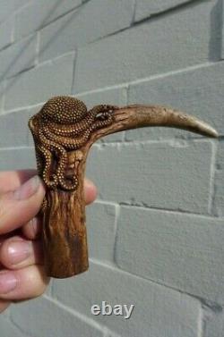 Antler deer real handle octopus design walking stick cutlery ect. Hand carved A