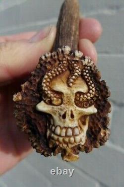 Antler deer real handle octopus design walking stick cutlery ect. Hand carved A