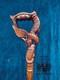 Carved Walking Stick Wild with our Eagle and Fish carved Cane comfortable