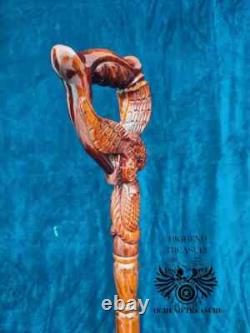 Carved Walking Stick Wild with our Eagle and Fish carved Cane comfortable