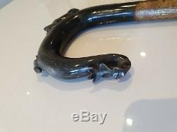 Carved shepherds crook/market stick/beaters/ in buffalo horn Cat Chasing Mouse