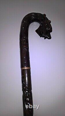 Chinese carved hardwood dragon walking stick with brass base lovely item