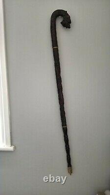 Chinese carved hardwood dragon walking stick with brass base lovely item