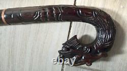 Chinese carved hardwood dragon walking stick with brass base lovely item