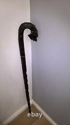 Chinese carved hardwood dragon walking stick with brass base lovely item