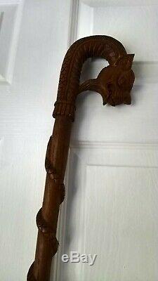 Chinese walking stick carved dragon and snake light but strong