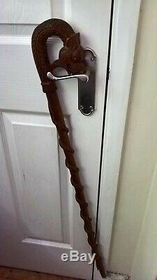 Chinese walking stick carved dragon and snake light but strong