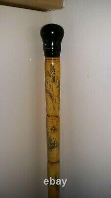 Chinese walking stick ornately carved solid and sturdy very functional