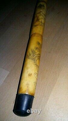 Chinese walking stick ornately carved solid and sturdy very functional