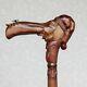 Custom walking cane Man in stocking cap with fly on the nose Hand carved walking