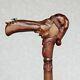 Custom walking stick cane Man in stocking cap with fly on the nose Hand carved