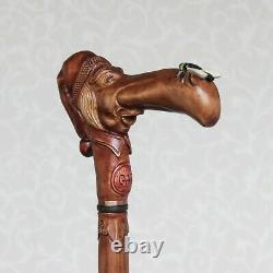 Custom walking stick cane Man in stocking cap with fly on the nose Hand carved