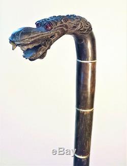 Fine old carved horn cane (walking stick) withNaga head from Java, Indonesia