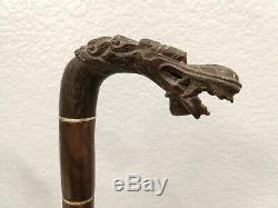 Fine old carved horn cane (walking stick) withNaga head from Java, Indonesia