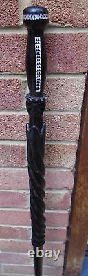 Hardwood ebony walking stick with Mop inlay and carved kings detail- lovely item