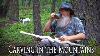 In The Peaceful Mountains Carving A Rattlesnake Walking Stick