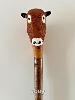 Limousin Bull carved by hand in lime on Hazel shank, walking stick or hiking