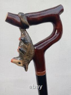 Opossum on a branch Beautiful carved walking stick custom. Handmade walking cane