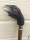 Rams horn walking stick carved cappercalie on a hazel shank with brass coller an