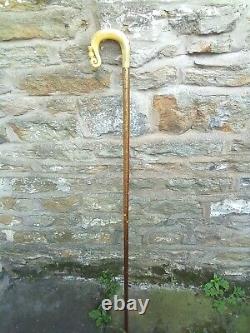 Rams horn walking stick or shepherds crook with scroll and thistle carving