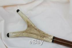 Unique collection of vintage hand carved walking sticks, crooks, shooting sticks