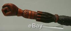 Victorian carved wood walking cane clenched fist handle carved parasol shaft