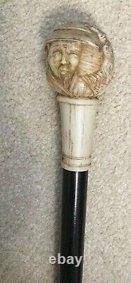 Vintage Antique Walking Stick Cane With Carved Bone Asian Faces Handle