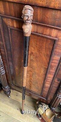 Vintage solid wood, heavy African hand carved walking stick